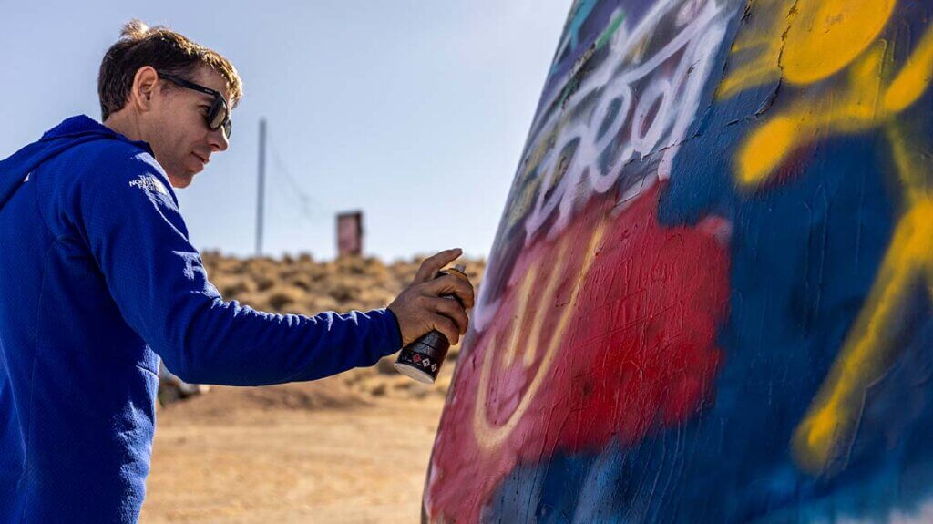 alex honnold tagging vehicle at international car forest